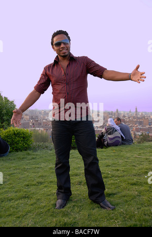 Young cool guy posing in Al Azhar Park in Cairo. Portrait from the fashion blog CAIRO LOOKS Stock Photo