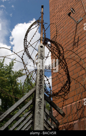 Barbed wire around the former prison in Moabit, Berlin, Germany Stock Photo