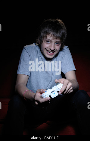 Teenager boy on computer in his room late at night Stock Photo - Alamy