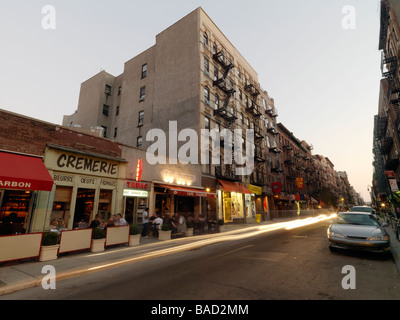 An evening street scene outside a French bar in New York's Lower East Side. Stock Photo