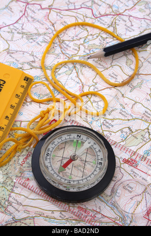 compass on an open map Stock Photo