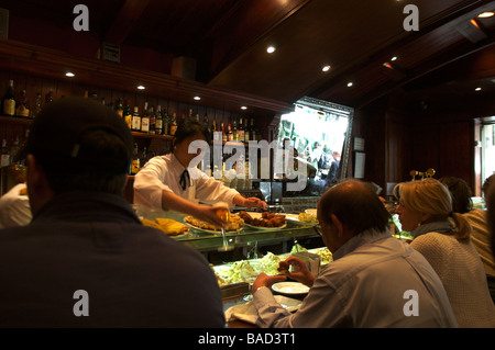 People eating in a Tapas Bar Stock Photo