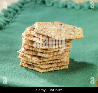 Multi grain crackers on a green napkin Stock Photo