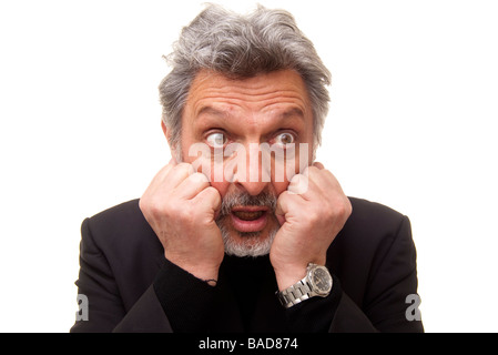 mature man looking shocked Stock Photo