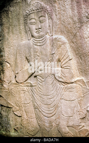 South Korea, Songnisan National Park, Popchu Sa Monastery, buddha carved on a huge rock Stock Photo