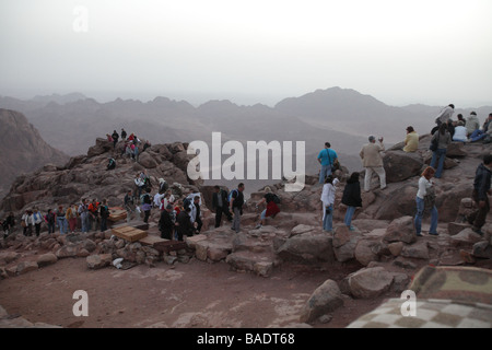 Pilgrims from St Katherines having climbed the Steps of Repentance watching the sunrise on Easter Monday on Mount Sinai Stock Photo