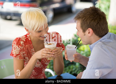 Couple on a Date at a Cafe Stock Photo