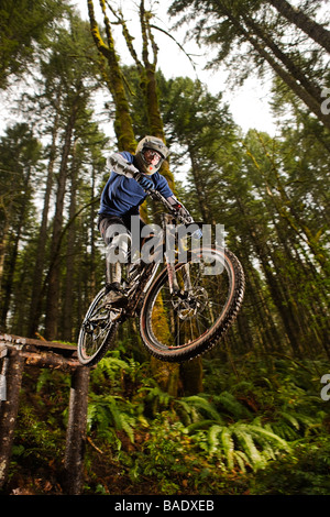 Mountain Biker Performing a Stunt, Blackrock Mountain Bike Park, Near Salem, Oregon, USA Stock Photo