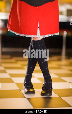 Close-up of Waitress's Legs and Skirt in a Retro Diner Stock Photo