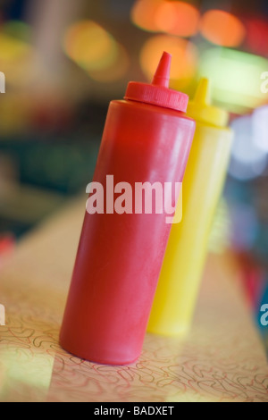 Close-up of Ketchup and Mustard Bottles in Retro Diner Stock Photo