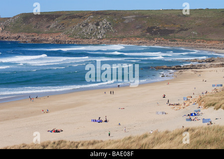 Sennen Cove sandy beach Cornwall on the Atlantic coast in April is popular with surfers and body boarders and holiday makers Stock Photo