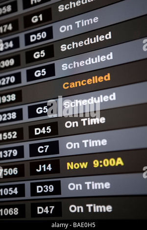 Airport Arrivals and Departures Board Stock Photo
