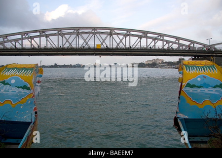 Trang Tien Brige spanning the Perfume River as seen from a tourist Dragon Boat at Hue Vietnam Stock Photo