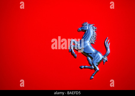 Red Ferrari prancing horse emblem Stock Photo - Alamy