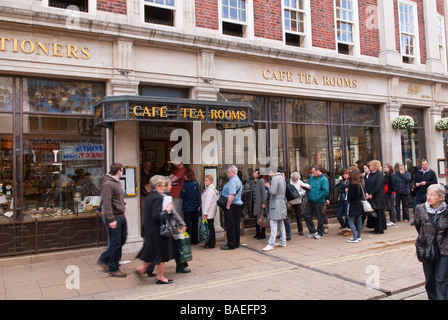 People queing up outside Bettys cafe tea rooms in York,Yorkshire,Uk Stock Photo