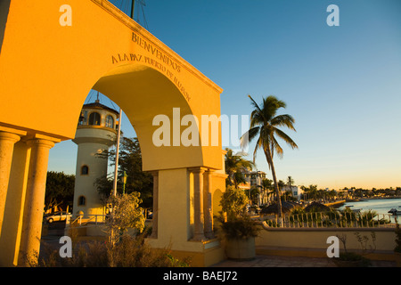 MEXICO La Paz Welcome arch at tourist dock and watchtower shaped as lighthouse along malecon La Paz Puerto de Ilusion Stock Photo
