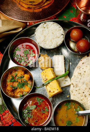 Gujarati food is primarily vegetarian and the traditional Gujrati thali consists of plenty of appetizing dishes Stock Photo