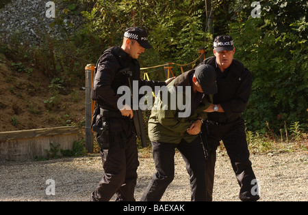 Humberside police officers training using firearms to subdue a man armed with a samurai sword Stock Photo