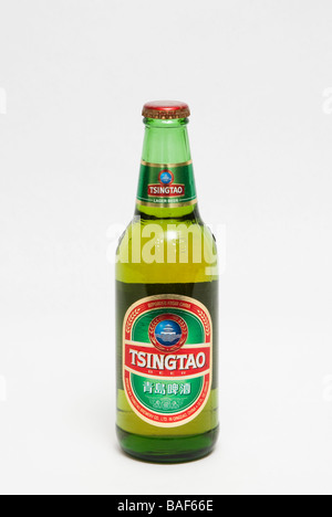 a bottle of Tsingtao beer on a white background Stock Photo