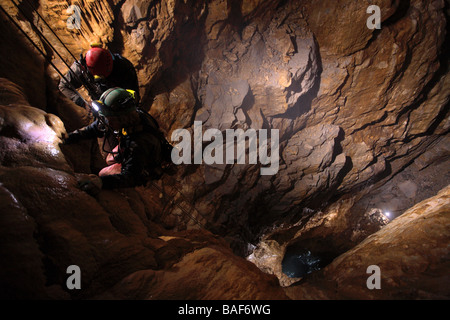 Kate Humble and Steve Backshall ascend the UK's largest natural shaft called Titan for BBC documentary entitle 'Ultimate Caving' Stock Photo