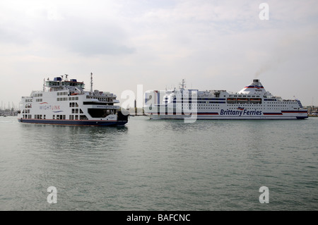 RORO ferries The Normandie of Brittany Ferries company and the St Clare and IOW ferry operated owned by Wightlink  Portsmouth Stock Photo