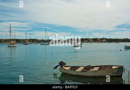 Old boat with outboard engine at Porto Colom Majorca Baleares Spain | Altes Boot mit Außenborder in Porto Colom Mallorca Spanien Stock Photo