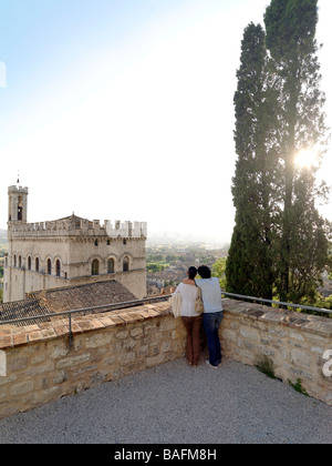 A young couple enjoys a romantic moment together in the Italian countryside. Stock Photo