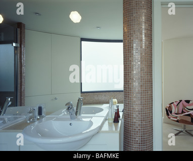 Car Designs House, London, United Kingdom, Bere Architects, Car designs house bathroom with chair. Stock Photo