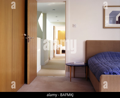 Car Designs House, London, United Kingdom, Bere Architects, Car designs house bedroom to stairs. Stock Photo