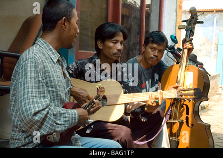 Street musicians at Jalan Surabaya, Jakarta , Indonesia Stock Photo