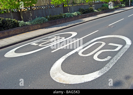 british road markings indicating a 20 miles per hour speed limit Stock Photo