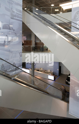 Mercedes Showroom, Stuttgart, Germany, Architect Unknown, Mercedes showroom mezzanine view of the esculators with reception Stock Photo