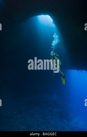 Diver in Blue Hole Cave Micronesia Palau Stock Photo