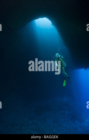 Diver in Blue Hole Cave Micronesia Palau Stock Photo