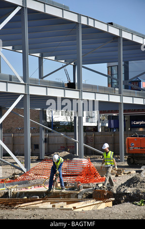 Workers on building construction site, Farnborough, Hampshire, England, United Kingdom Stock Photo