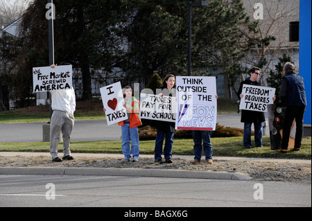 Ordinary citizen protesters protest taxes and other government wasteful spending Stock Photo