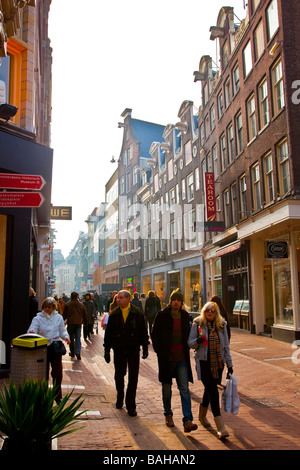 People walking in the Kalverstraat, the center of Amsterdam Netherlands Stock Photo