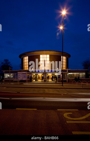 Arnos Grove Underground Station, London, United Kingdom, Charles Holden, Arnos grove underground station exterior at night. Stock Photo