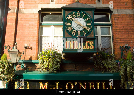 O'Neils Bar and clock, Dublin, Ireland Stock Photo