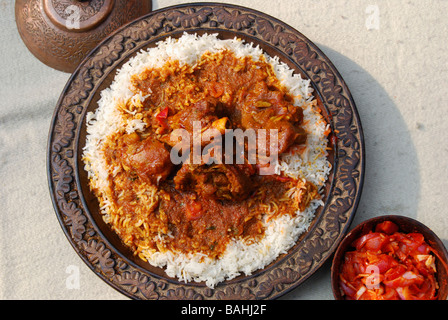 Rogan josh is an aromatic mutton curry made from lamb or goat cooked in fresh Indian spices and red chilly curry Stock Photo