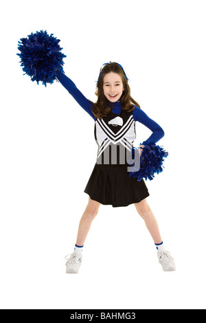 Ten year old caucasian girl dressed as cheerleader Stock Photo
