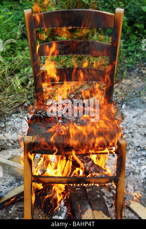 hot seat fire flames heat burn Stock Photo