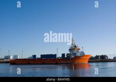 Oil rig supply boat leaving Aberdeen harbour Stock Photo