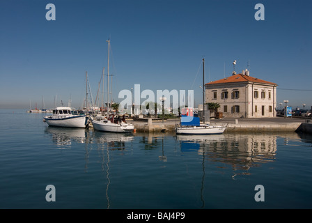 Harbor of Koper with boats and a hut Slovenia Eastern Europe Stock Photo