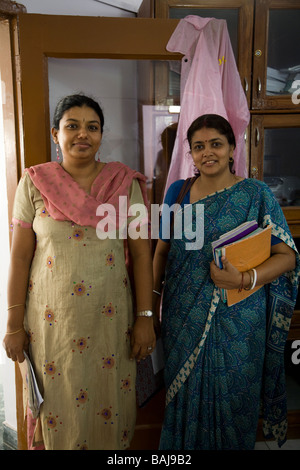 Women teachers in the staffroom at a school in Hazira, near Surat. Gujarat. India Stock Photo