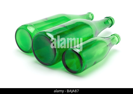 Three green glass bottles on white background Stock Photo