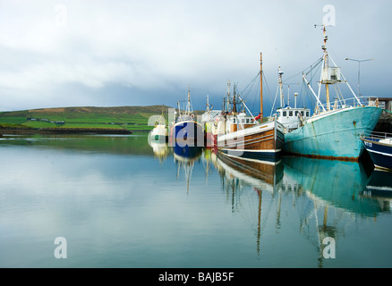 Reflections of ships in the small town of Dingle Bay, Dingle Bay Peninsula, County Kerry, Ireland Stock Photo