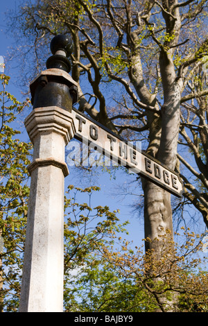 UK England Cheshire Alderley Edge cast iron public footpath sign to the edge through beech woodland Stock Photo