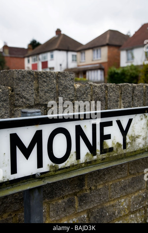 Road sign for Money Avenue. Stock Photo