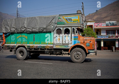 Colourful lorry transporting goods. Tata Bhutan Asia. Decorated in bright colours. Horizontal 92831 Nepal-Duman Stock Photo